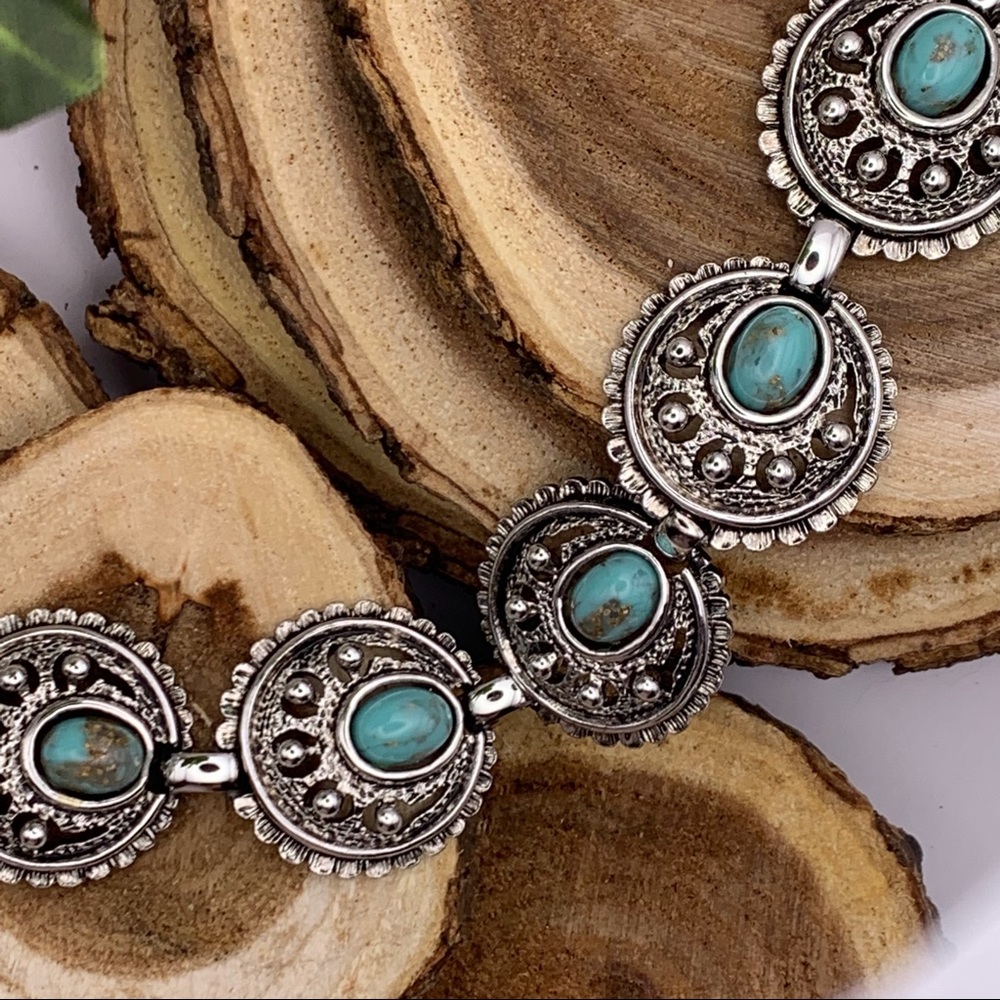 Sarah Coventry faux turquoise silver-tone bracelet.